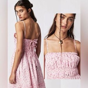 Free People Gabby mini dress in pink with a cherry or floral pattern